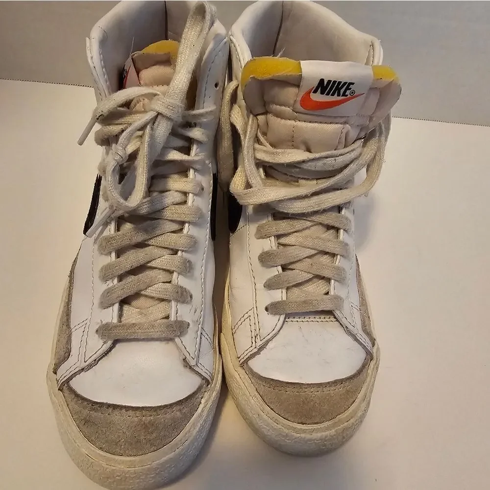 Nike leather hi top sneakers size 6. White with black swish